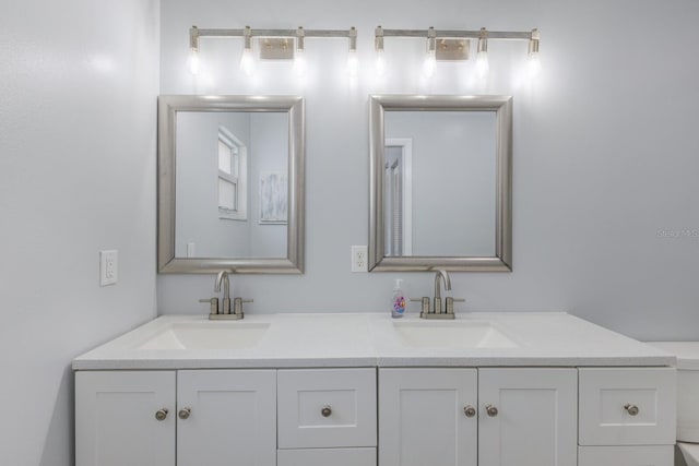 8985 Pohoy Ave, Sarasota, FL 34231 - bathroom featuring double vanity