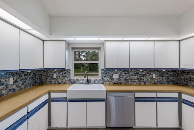8985 Pohoy Ave, Sarasota, FL 34231 - kitchen featuring dishwasher, wood counters, and backsplash