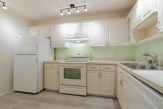 3680 Ironwood Cir Unit 603L, Bradenton, FL 34209 - kitchen with white appliances, under cabinet range hood, white cabinetry, glass insert cabinets, and light countertops