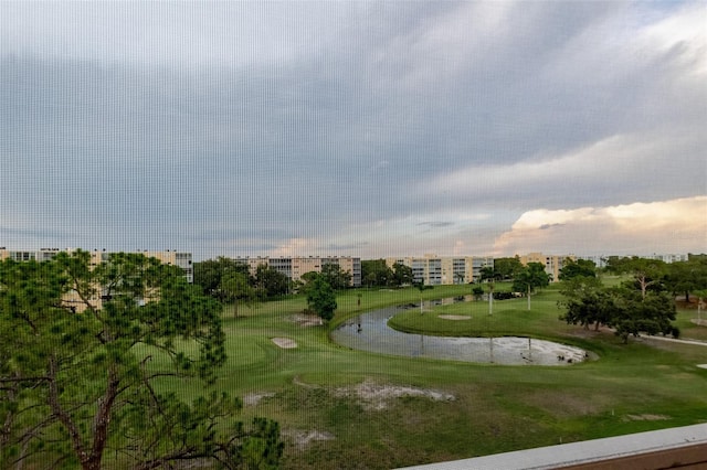 3680 Ironwood Cir Unit 603L, Bradenton, FL 34209 - view of community with a yard, golf course view, and a water view