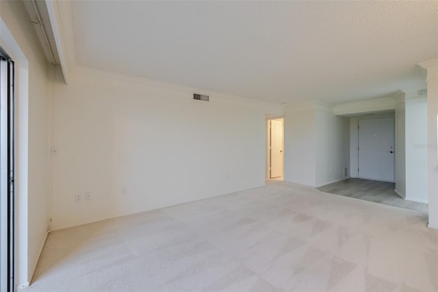 3680 Ironwood Cir Unit 603L, Bradenton, FL 34209 - spare room with light carpet and ornamental molding