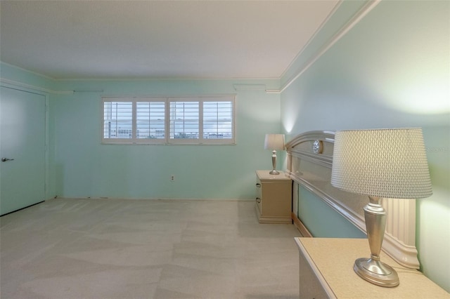 3680 Ironwood Cir Unit 603L, Bradenton, FL 34209 - unfurnished bedroom featuring carpet flooring and ornamental molding