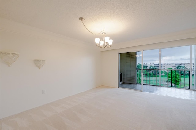 3680 Ironwood Cir Unit 603L, Bradenton, FL 34209 - carpeted empty room with a chandelier, ornamental molding, and a textured ceiling