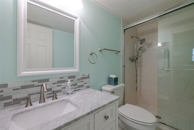 3680 Ironwood Cir Unit 603L, Bradenton, FL 34209 - bathroom with a shower stall, vanity, and tasteful backsplash