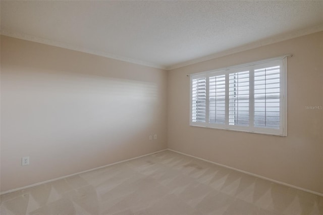 3680 Ironwood Cir Unit 603L, Bradenton, FL 34209 - unfurnished room with light colored carpet, crown molding, and a textured ceiling