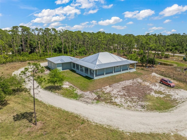 8146 Tropicaire Blvd, North Port, FL 34291 - view from above of property with a heavily wooded area