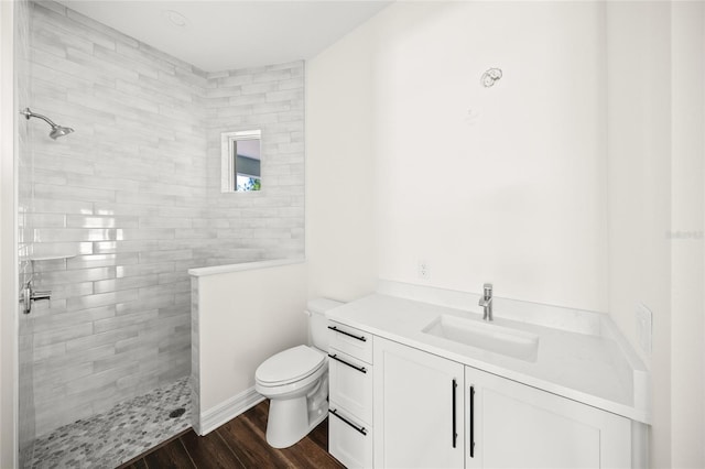 8146 Tropicaire Blvd, North Port, FL 34291 - full bathroom featuring a walk in shower, vanity, and wood finished floors