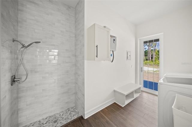 8146 Tropicaire Blvd, North Port, FL 34291 - washroom featuring washer / clothes dryer and dark wood-type flooring