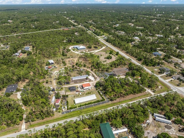 8146 Tropicaire Blvd, North Port, FL 34291 - aerial overview of property's location featuring a forest