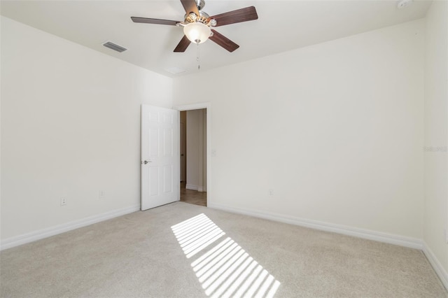 11221 Sandhill Preserve Dr, Sarasota, FL 34238 - empty room with light colored carpet and a ceiling fan