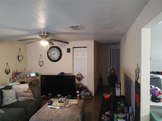 1423 17th Ave E, Bradenton, FL 34208 - living room with a ceiling fan and wood finished floors
