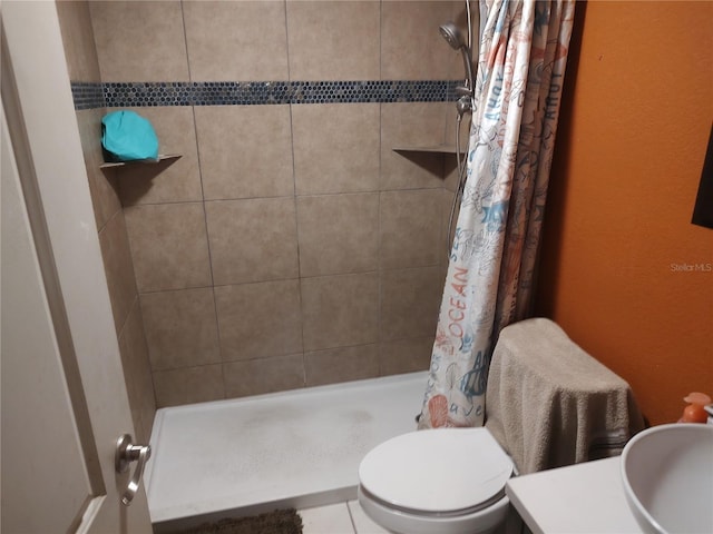 1423 17th Ave E, Bradenton, FL 34208 - bathroom featuring a stall shower, vanity, and a textured wall