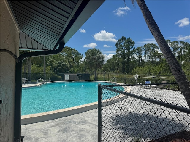 1999 Kings Hwy Unit 26A, Punta Gorda, FL 33980 - community pool featuring view of scattered trees