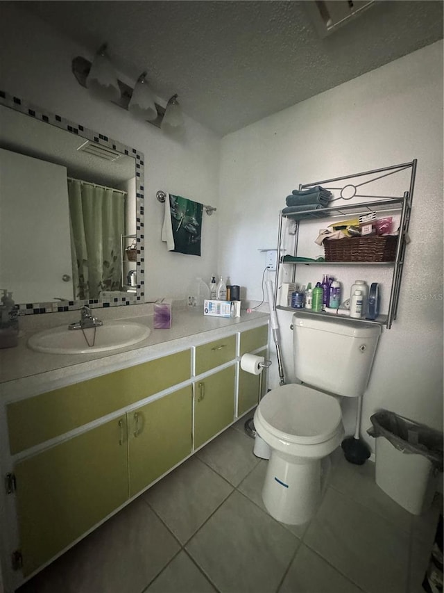1999 Kings Hwy Unit 26A, Punta Gorda, FL 33980 - full bathroom featuring vanity, tile patterned flooring, a shower with shower curtain, and a textured ceiling