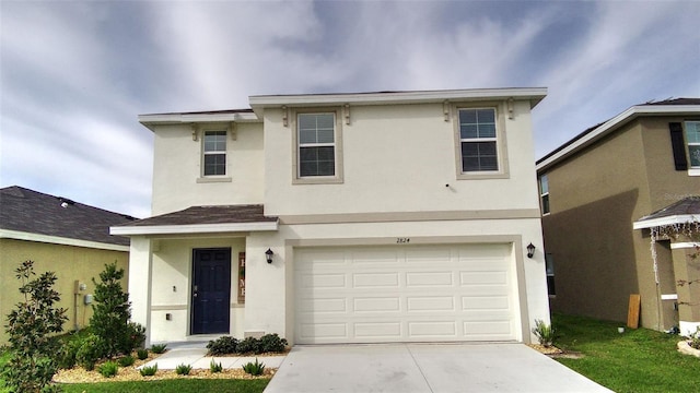 2824 Rock Sound St, Bradenton, FL 34208 - traditional-style house with stucco siding, concrete driveway, and an attached garage