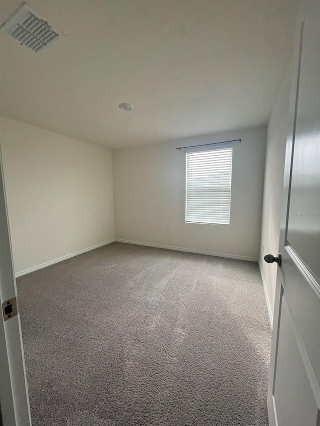 2824 Rock Sound St, Bradenton, FL 34208 - carpeted empty room featuring baseboards