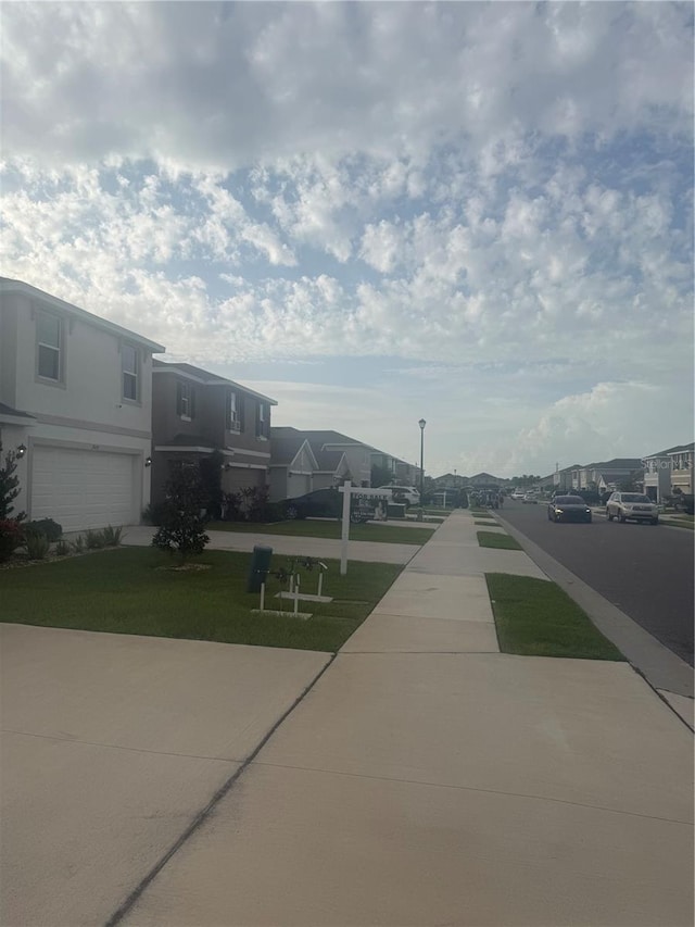 2824 Rock Sound St, Bradenton, FL 34208 - view of asphalt road with a residential view and sidewalks
