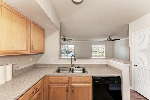 1030 Villagio Cir Unit 103, Sarasota, FL 34237 - kitchen with black dishwasher, ceiling fan, light countertops, and a peninsula