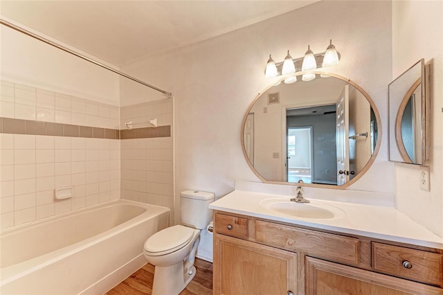 1030 Villagio Cir Unit 103, Sarasota, FL 34237 - full bath featuring vanity, wood finished floors, and washtub / shower combination