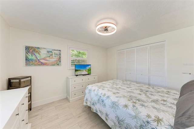 726 Jungle Queen Way, Longboat Key, FL 34228 - bedroom with a closet and baseboards