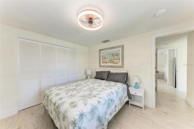 726 Jungle Queen Way, Longboat Key, FL 34228 - bedroom featuring a closet and baseboards