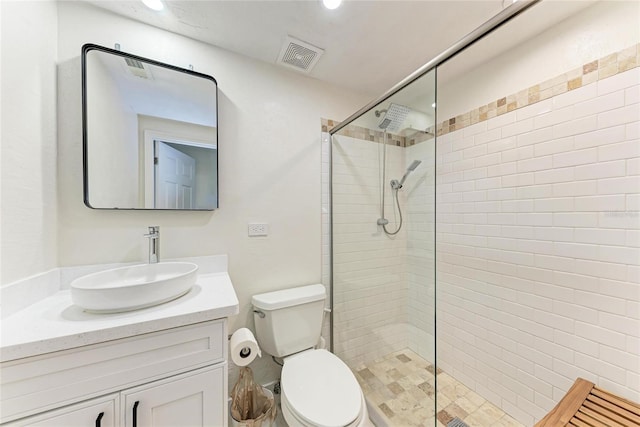 726 Jungle Queen Way, Longboat Key, FL 34228 - bathroom with vanity, a tile shower, and recessed lighting