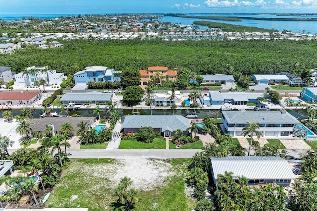 726 Jungle Queen Way, Longboat Key, FL 34228 - aerial perspective of suburban area featuring a large body of water