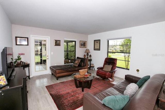 6504 Heritage Ln Unit 99, Bradenton, FL 34209 - living area featuring plenty of natural light and wood finished floors