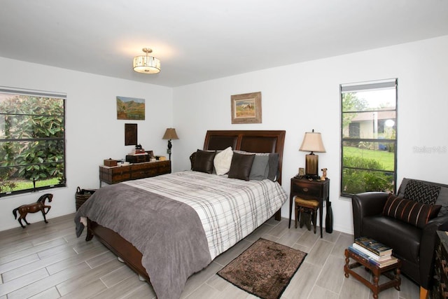 6504 Heritage Ln Unit 99, Bradenton, FL 34209 - bedroom with wood tiled floors