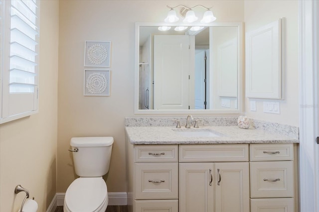 501 Tamiami Trl N Unit 201, Venice, FL 34285 - bathroom featuring vanity and toilet