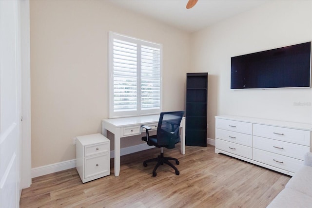 501 Tamiami Trl N Unit 201, Venice, FL 34285 - home office with light wood-style flooring and ceiling fan