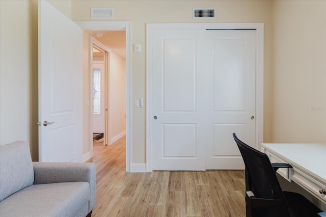 501 Tamiami Trl N Unit 201, Venice, FL 34285 - office area with light wood-type flooring and baseboards