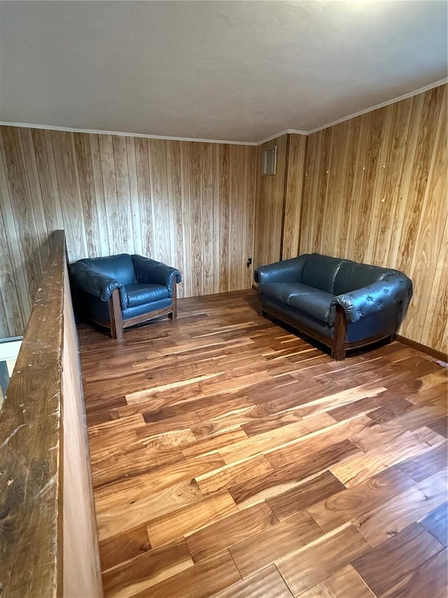 1123 NW 192nd Ave, Gainesville, FL 32609 - living area featuring wood finished floors and wooden walls