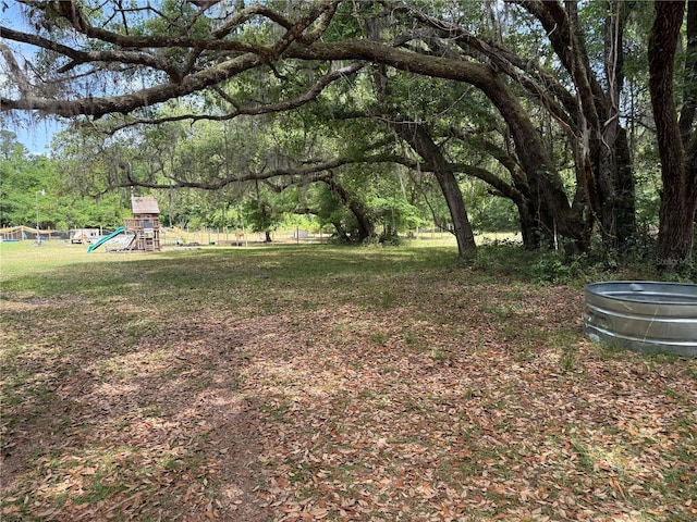 1123 NW 192nd Ave, Gainesville, FL 32609 - view of yard featuring a playground