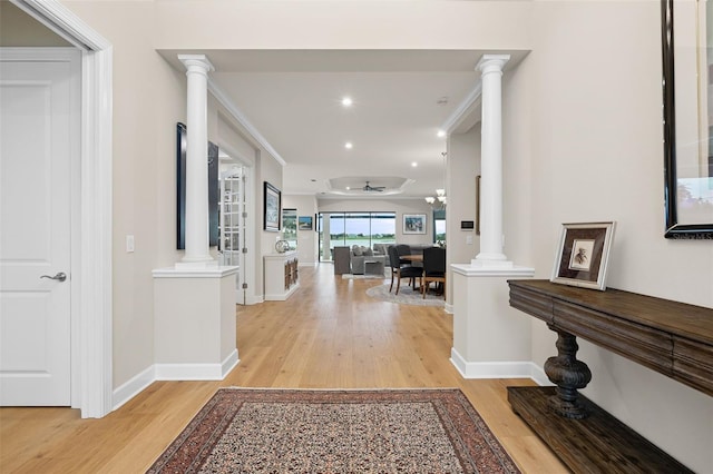 3968 Santa Caterina Blvd, Bradenton, FL 34211 - hallway with ornate columns, light wood-type flooring, and recessed lighting