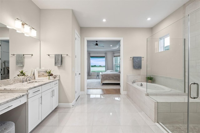 3968 Santa Caterina Blvd, Bradenton, FL 34211 - ensuite bathroom with vanity, a garden tub, ceiling fan, recessed lighting, and a shower stall