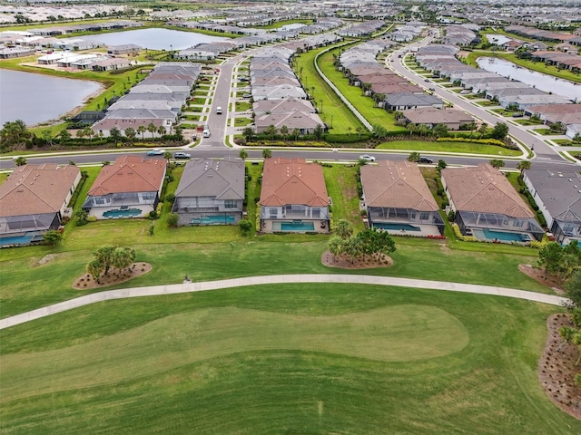 3968 Santa Caterina Blvd, Bradenton, FL 34211 - aerial perspective of suburban area with a nearby body of water and a golf course