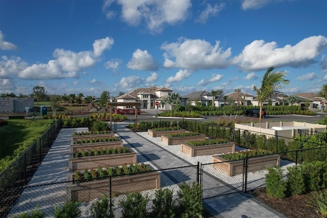 3968 Santa Caterina Blvd, Bradenton, FL 34211 - view of home's community with a residential view, a garden, and a gate