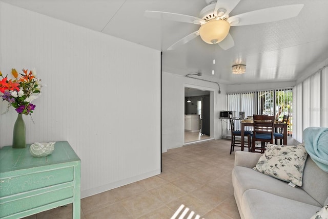4309 Chinaberry Cir, Bradenton, FL 34208 - living room featuring ceiling fan and light tile patterned flooring