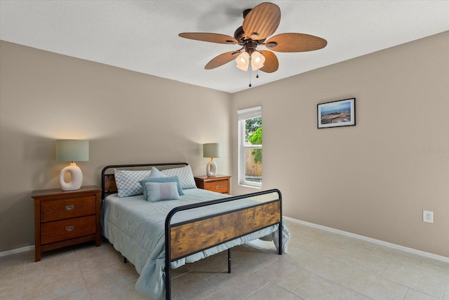 4309 Chinaberry Cir, Bradenton, FL 34208 - bedroom featuring light tile patterned flooring and a ceiling fan