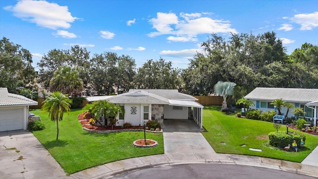 4309 Chinaberry Cir, Bradenton, FL 34208 - view of front facade featuring concrete driveway and a carport