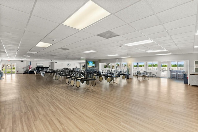 4309 Chinaberry Cir, Bradenton, FL 34208 - exercise room featuring wood finished floors and a paneled ceiling