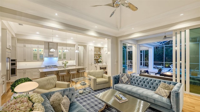 1530 Pine Bay Dr, Sarasota, FL 34231 - living area featuring ceiling fan, ornamental molding, a sunroom, and recessed lighting