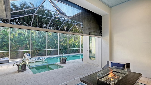 1530 Pine Bay Dr, Sarasota, FL 34231 - view of pool with a fire pit, a patio, a lanai, and a pool with connected hot tub