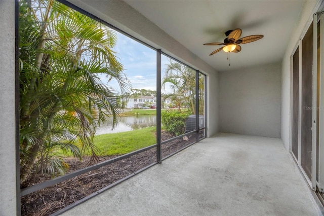6454 Baytown Dr, Sarasota, FL 34240 - unfurnished sunroom featuring a water view and ceiling fan