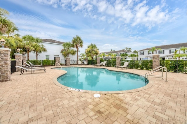 6454 Baytown Dr, Sarasota, FL 34240 - community pool featuring a patio