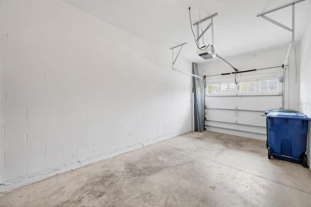 6454 Baytown Dr, Sarasota, FL 34240 - garage featuring a garage door opener