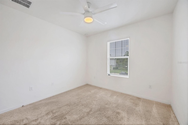 6454 Baytown Dr, Sarasota, FL 34240 - empty room featuring carpet floors and ceiling fan