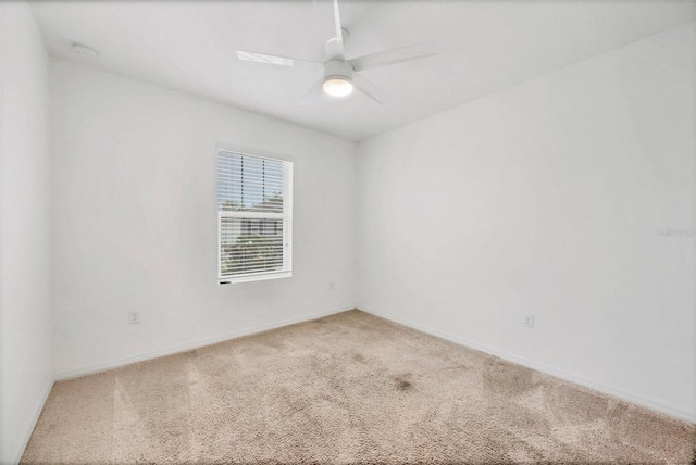 6454 Baytown Dr, Sarasota, FL 34240 - unfurnished room with carpet flooring, ceiling fan, and a smoke detector