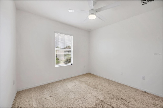 6454 Baytown Dr, Sarasota, FL 34240 - carpeted spare room featuring a ceiling fan and baseboards